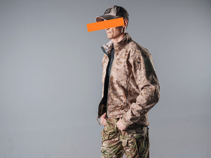 Side view of a model wearing the tan AOR1 digital camouflage BKG ARC-Style LEAF Minotaur softshell jacket zipped to the collar.