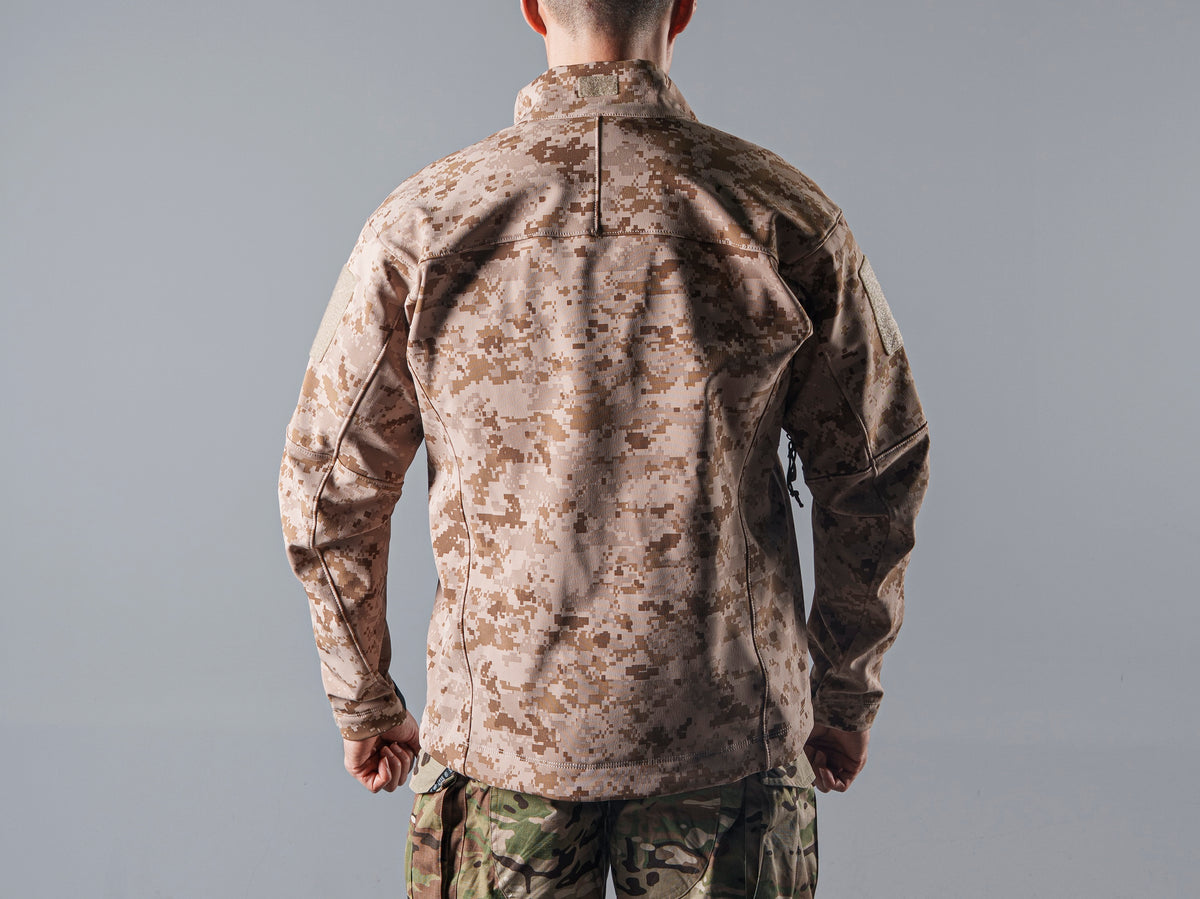 Close back view of the tan AOR1 digital camouflage Minotaur softshell jacket showing its shoulder seams and rear panel.
