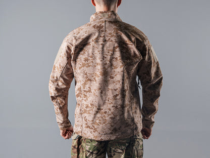 Close back view of the tan AOR1 digital camouflage Minotaur softshell jacket showing its shoulder seams and rear panel.